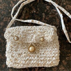 Cute handmade, small, white purse.